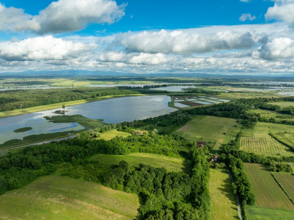 Scenic aerial landscape of lakes and farmlands in Garešnica, Croatia